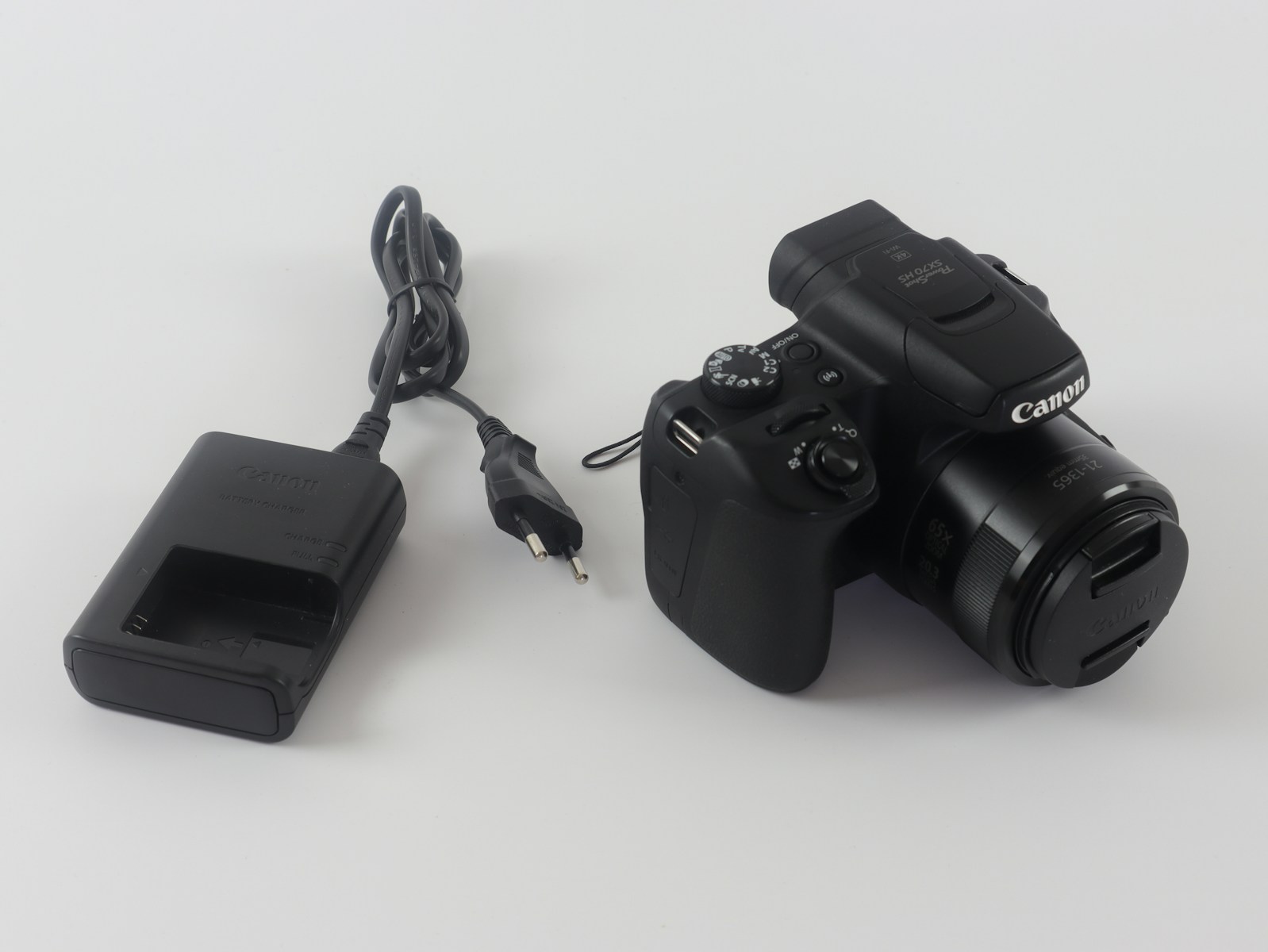 a camera with a charger attached to it